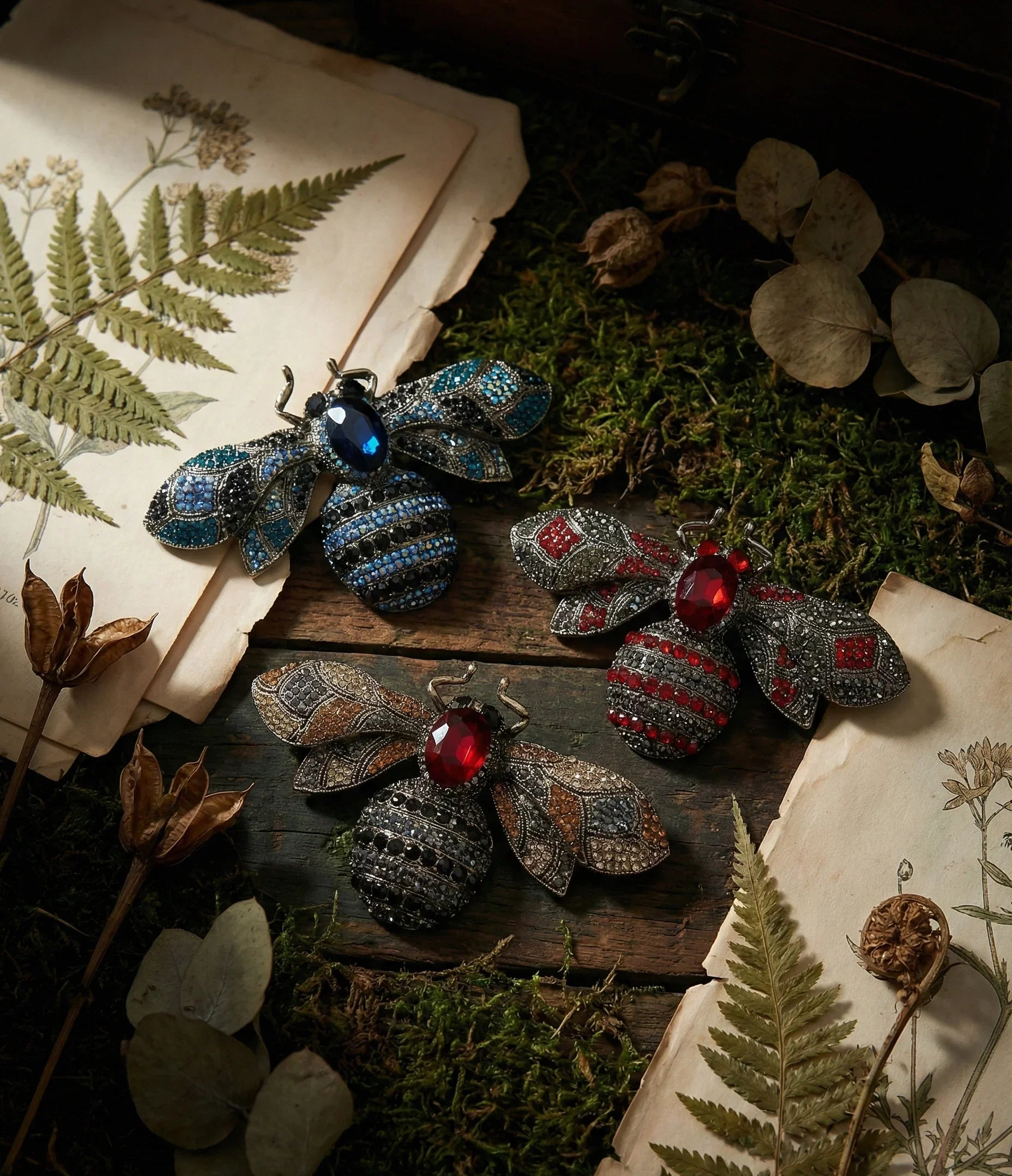 Botanical Gothic insect brooch set of three jewel bee statement pins in amber, blue, and red, 10cm wide